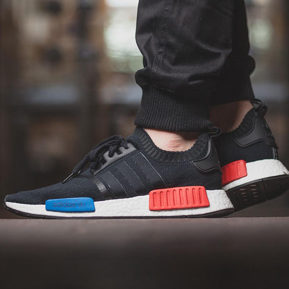 ADIDAS NMD RUNNER PRIMEKNIT NERO CORE - ROSSO LUSSUREGGIANTE