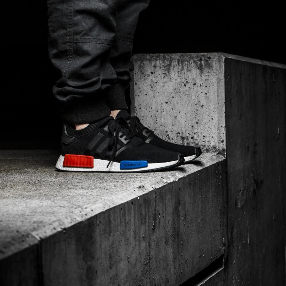 ADIDAS NMD RUNNER PRIMEKNIT NERO CORE - ROSSO LUSSUREGGIANTE
